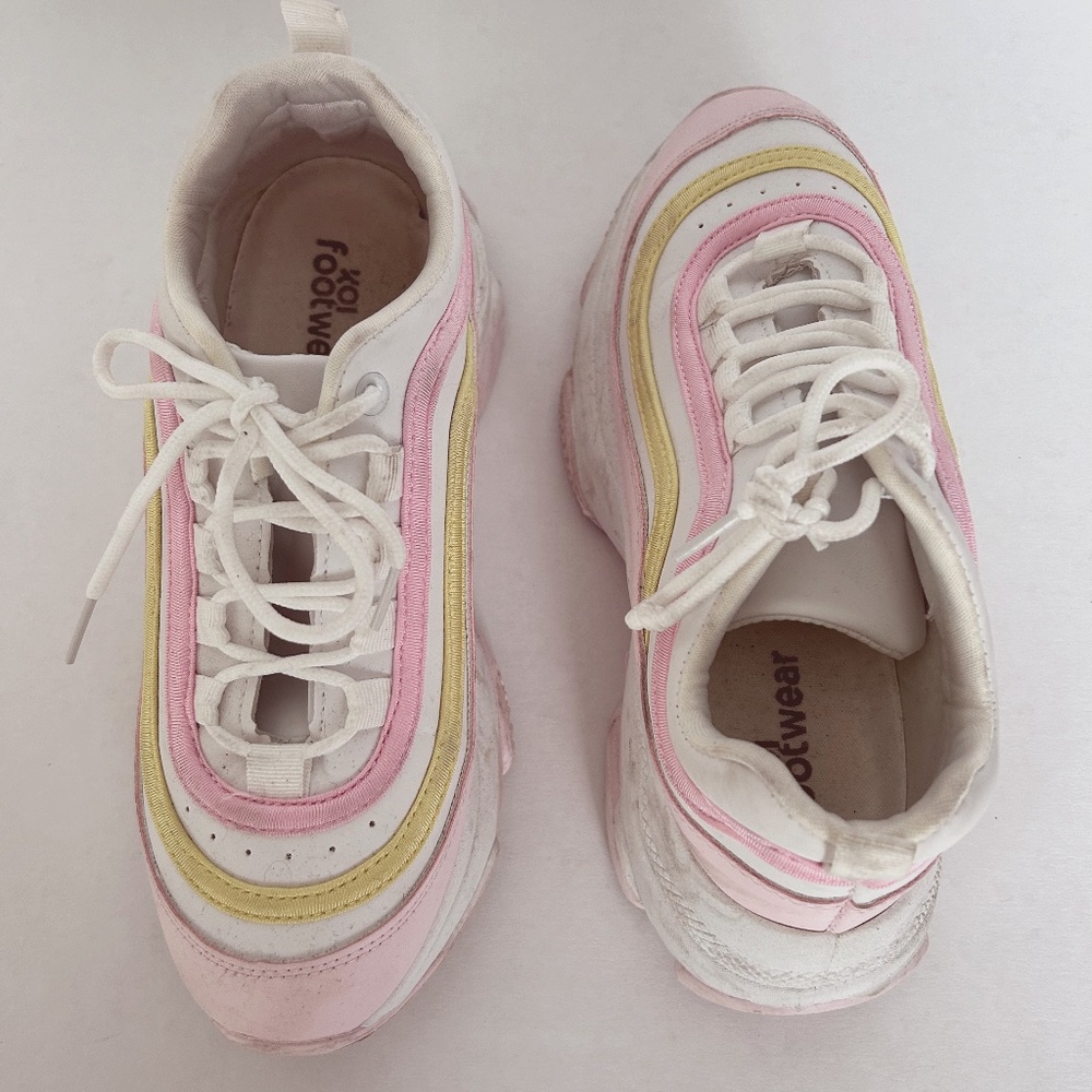 Pink and yellow sneakers